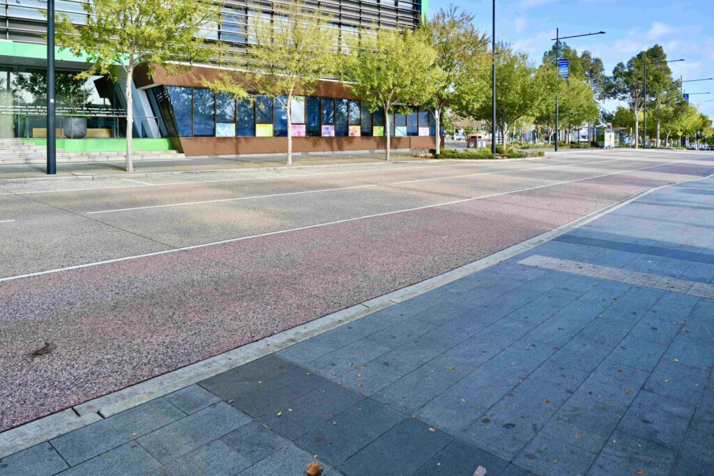 A top-down aerial view of the Hawthorn Town Hall forecourt, highlighting the intricate, geometric design of the stone staircases and plazas supplied by Eigen Stones.